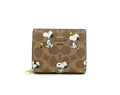 Coach X Peanuts Snap Wallet In Signature Canvas With Snoopy Print CBN32